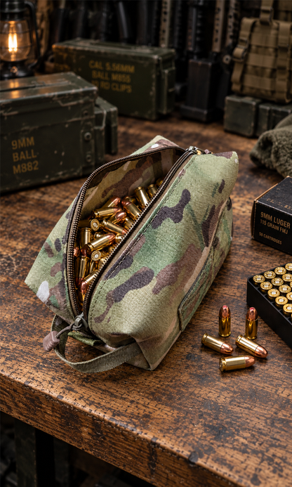 Tactical ammo bag filled with loose 9mm ammunition